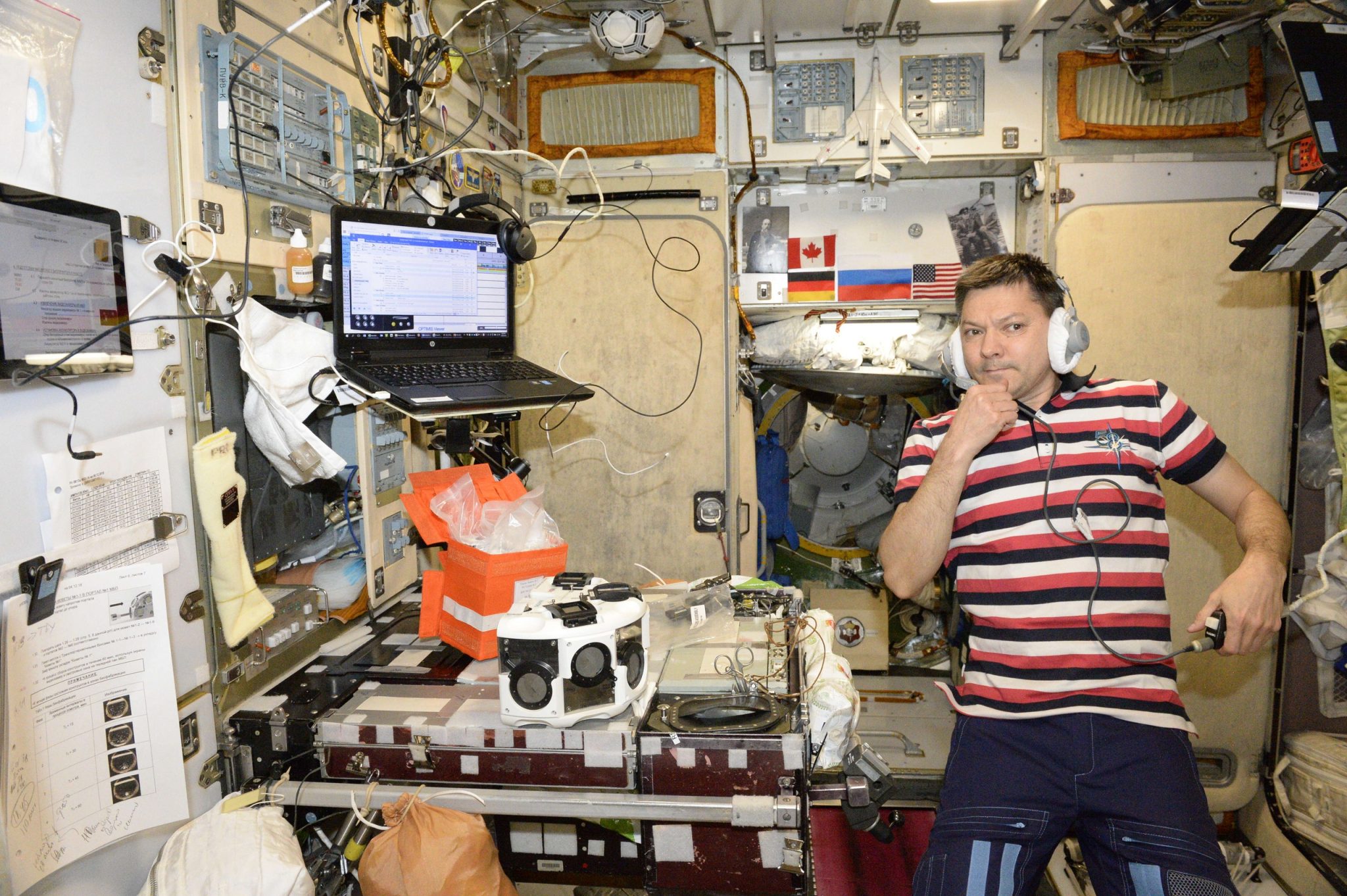 Russian cosmonaut Oleg Kononenko using OrganAut in the ISS. Photo via 3D Bioprinting Solutions.