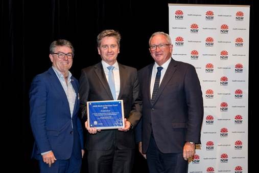 Professor Gordon Wallace, Professor Gerard Sutton and NSW Minister for Medical Research, Brad Hazzard, receiving the NSW Government at Parliament House on Wednesday night. Photo via the University of Sydney.